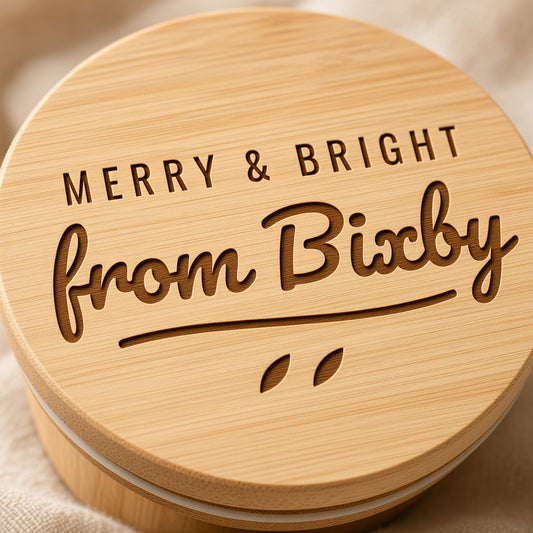 Close-up of laser engraved bamboo candle lid, Merry & Bright from Bixby