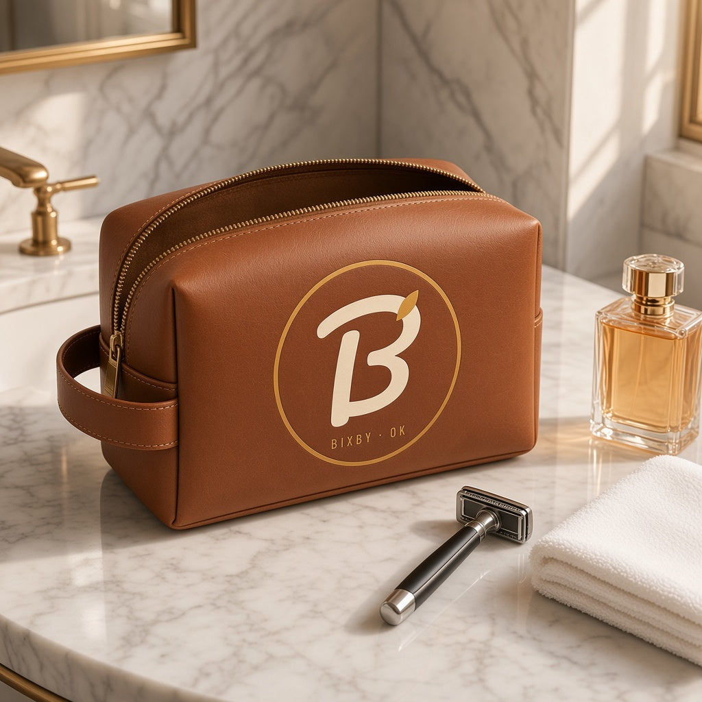Leather Bixby B monogram dopp kit on a marble vanity