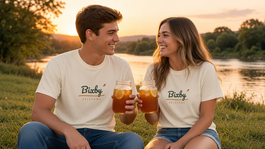Bixby Oklahoma Script Tee worn in a garden setting