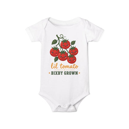 Baby bodysuit printed with lil tomato.